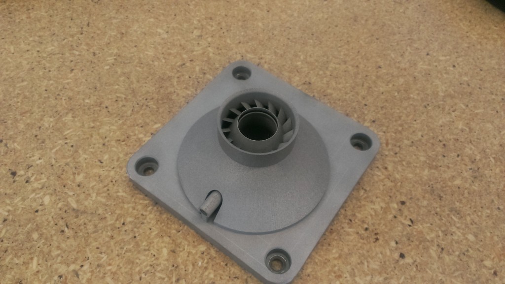 Fresh out of the machine! This piece printed overnight on our 3D Systems ProX 100 – we could tell from the get-go that the part was a success.
