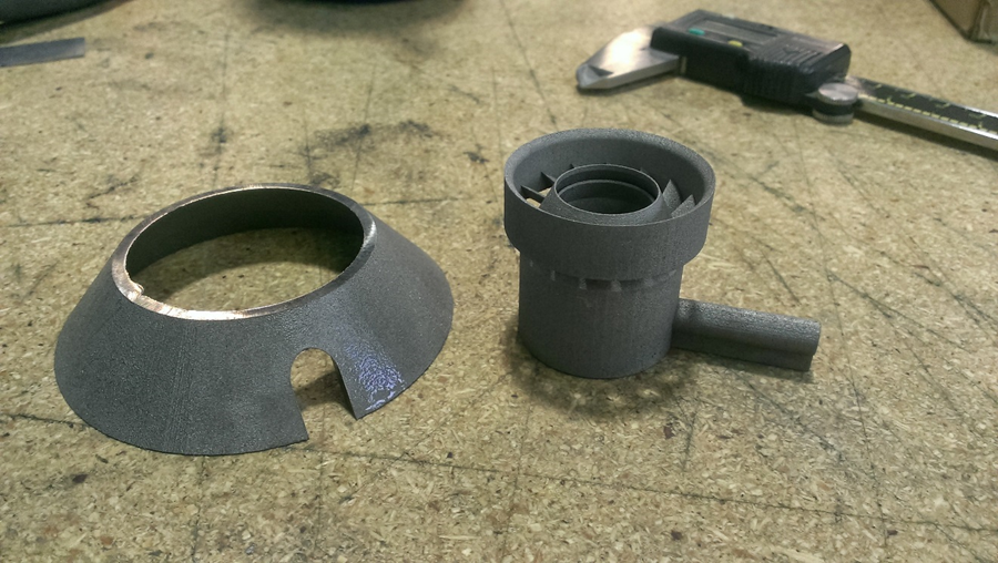 The parts sliced off of the build platform after wire EDM.