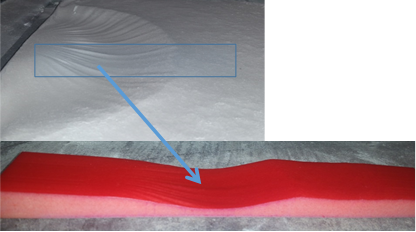 The box represents the scanned sand section and the red piece is a tinted polyjet piece created using Xometry's Objet Connex 500 (PolyJet 3D Printer).